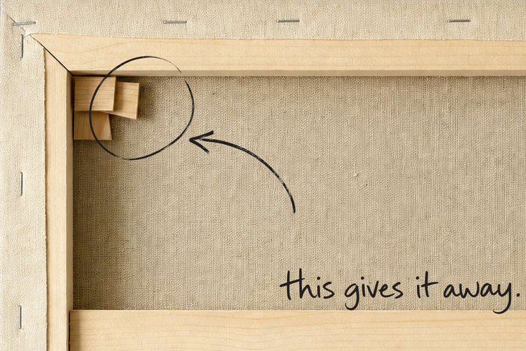 The back of a stretched canvas, its wooden keys and staples visible, the wooden keys and staples circled in open black marker, an arrow from the handwritten words this gives it away, by Willem van der Krieken