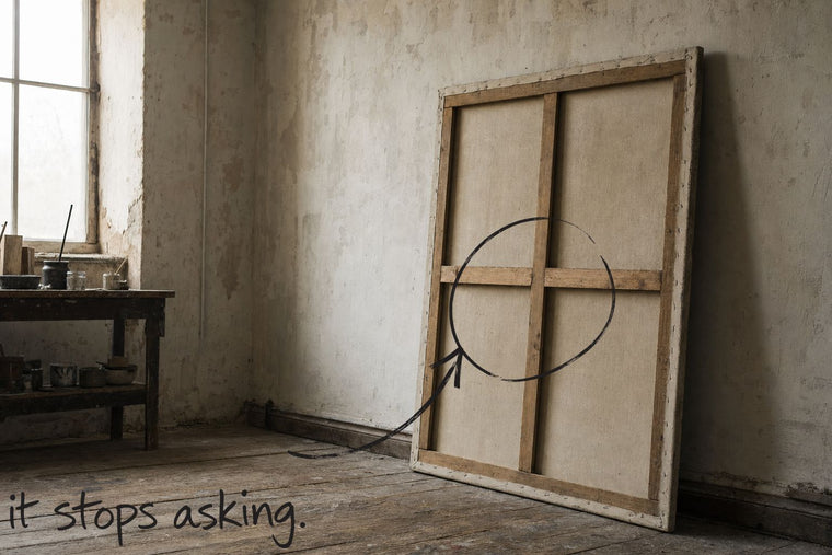 A stretched canvas standing in a studio with its face turned to the wall, only the stretcher bars visible, the canvas turned to the wall circled in open black marker, an arrow from the handwritten words it stops asking, by Willem van der Krieken